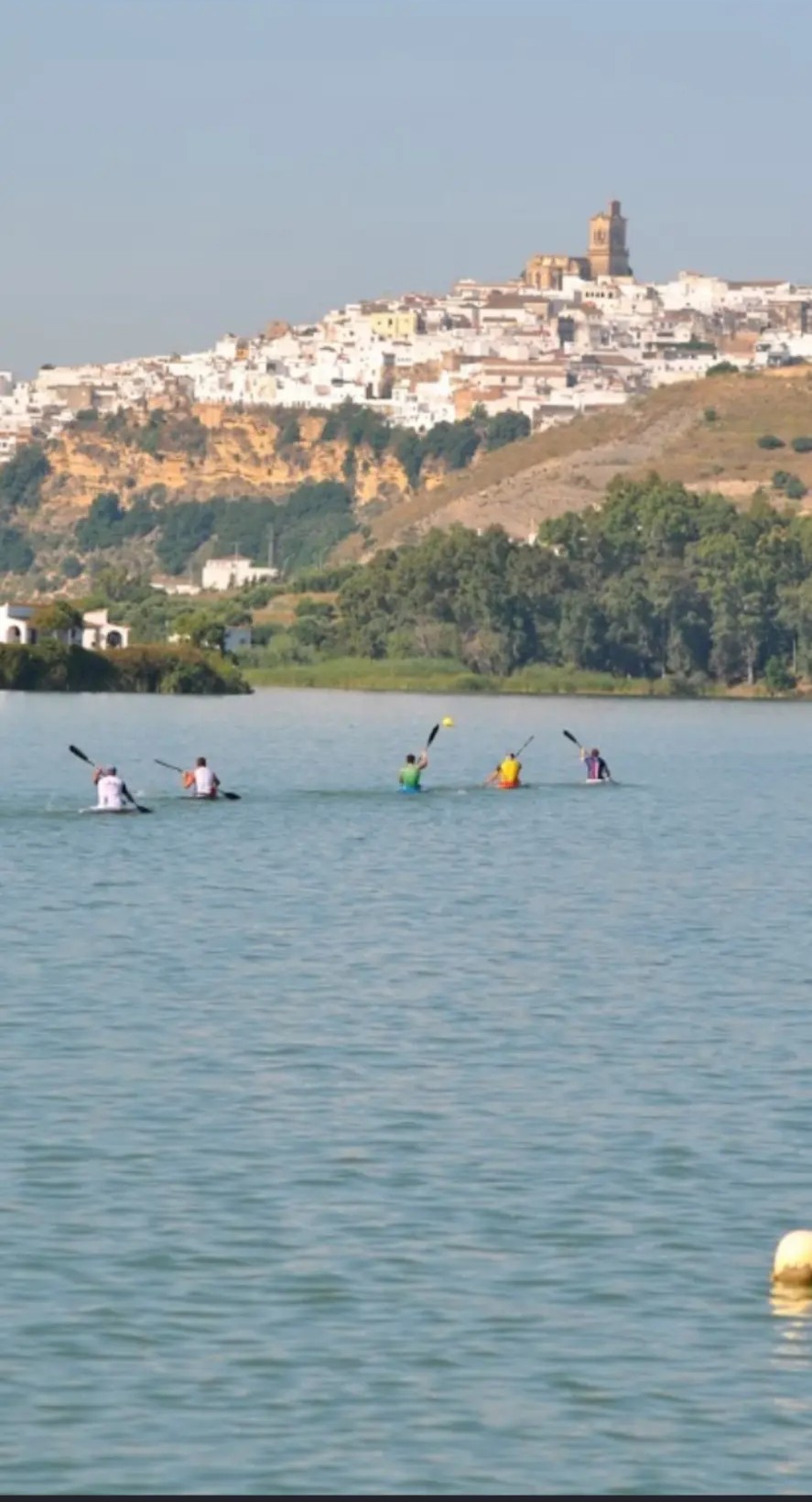 Team paddling below Arcos de la Frontera